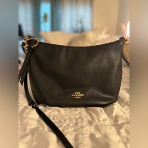 Coach black handbag with crossbody strap